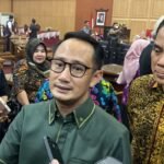 fairid naparin dan achmad zaini usai rapat terbuka pembahasan banpres 10 Miliar |